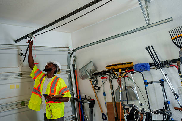 Professional Garage Door Panel Replacement technician working in Muscatine, IA